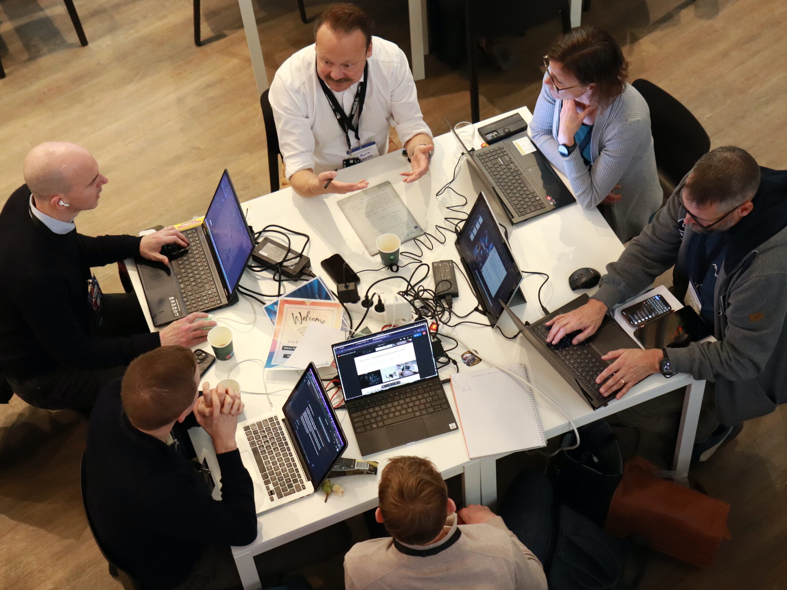 Team working with challenges during our Amyna Hackathon in November 2025